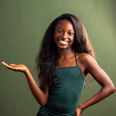 Smiling African-American woman gesturing hand