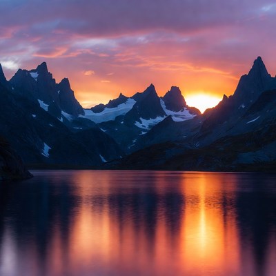Sunset over Jagged Mountains and Lake