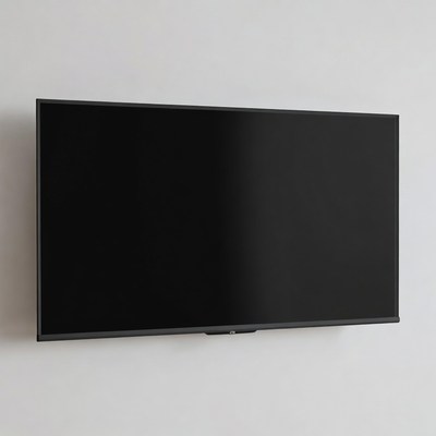 Large Black TV Mounted on White Wall