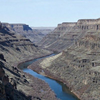 River Winding Through Deep Canyon