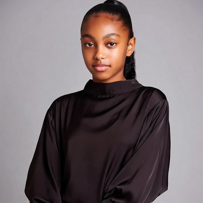 African-American girl in black satin top