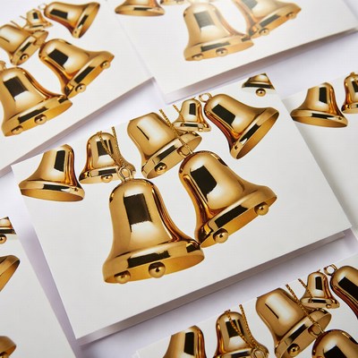 Shiny Gold Bells on White Background
