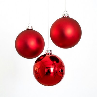 Three Red Christmas Ornaments Hanging