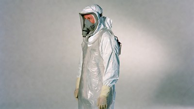 Man in white hazmat suit