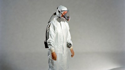 Man in hazmat suit with respirator