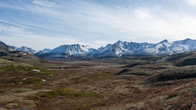 Snowy Mountains Over Autumn Valley
