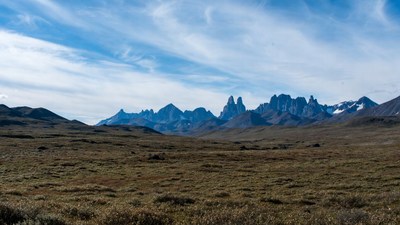 Snow-capped Mountains in Vast Grassland