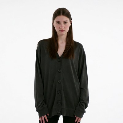 Woman wearing oversized gray cardigan