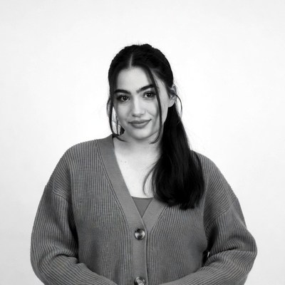 Smiling woman in cardigan