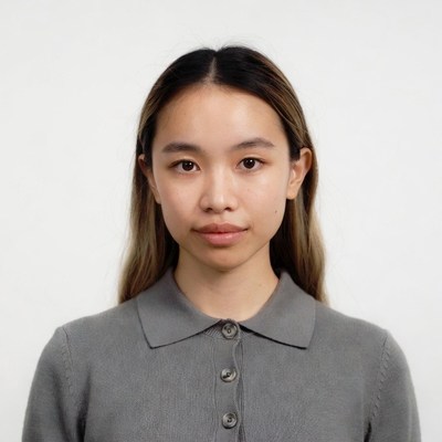 Asian woman in gray polo shirt