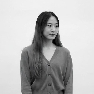 Asian woman in cardigan