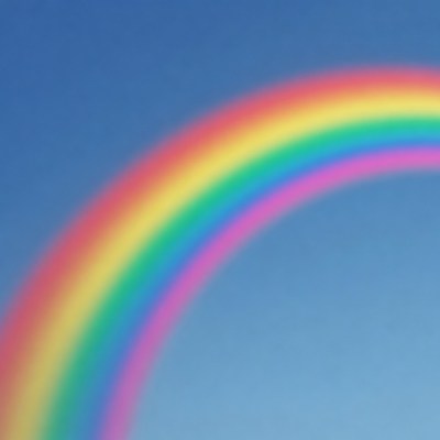 Vibrant Rainbow in Blue Sky