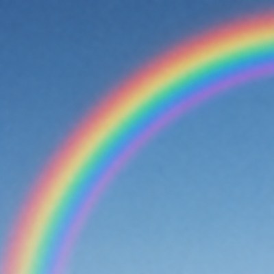 Vibrant Rainbow in Blue Sky