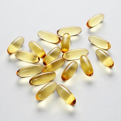 Yellow Gelatin Capsules Scattered