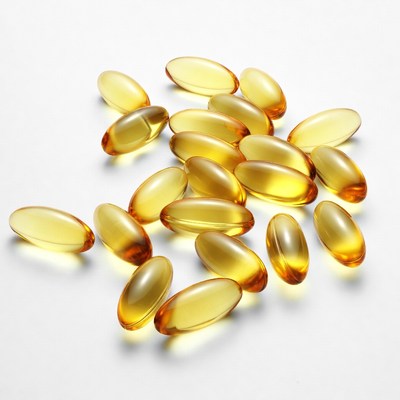 Yellow Fish Oil Capsules Scattered