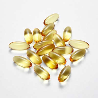 Yellow Fish Oil Capsules Pile