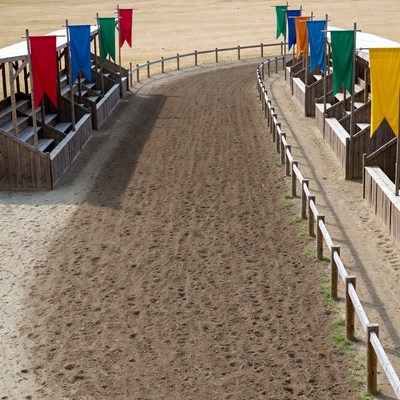 Dirt Track with Colorful Bleachers