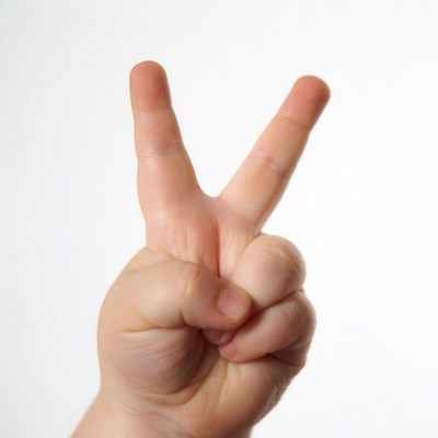 Hand making peace sign