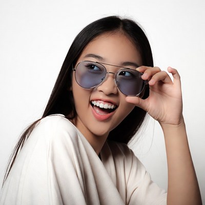 Asian girl smiling with sunglasses