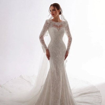 Woman in Lace Wedding Dress with Veil