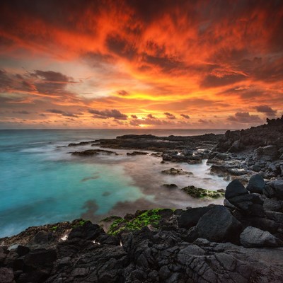 Dramatic Sunset Over Rocky Ocean Coast