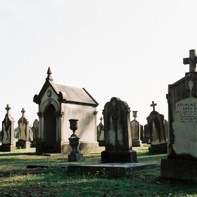 Old cemetery with tombstones and mausoleum