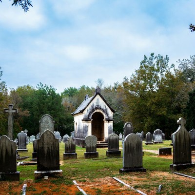 Small White Mausoleum in Cemetery