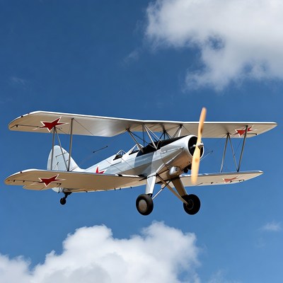 Soviet Biplane Flying in Blue Sky