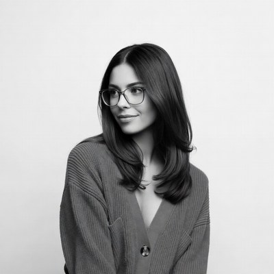 Woman in glasses looking sideways