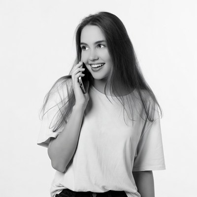 Woman talking on phone smiling