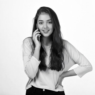 Young woman talking on phone