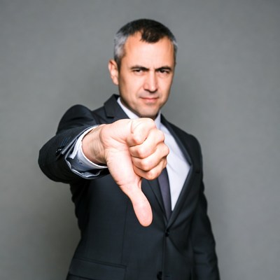 Man giving thumbs down gesture