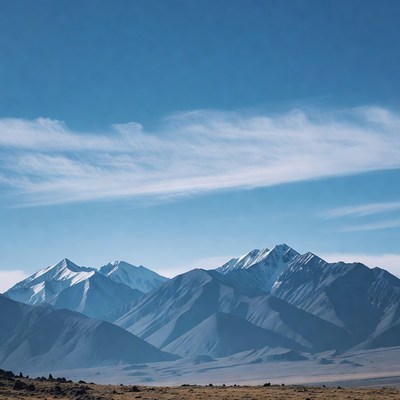 Snow-capped Mountains in Desert Landscape