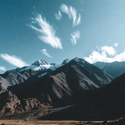 Snowy Mountains with Heart Clouds
