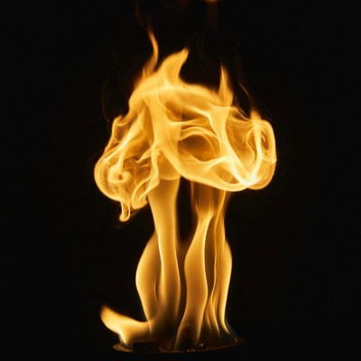 Bright yellow flames on black background