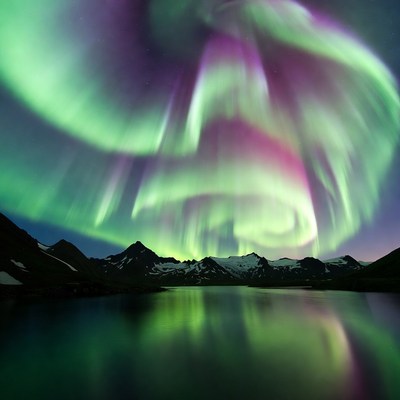 Northern Lights over Mountains and Lake