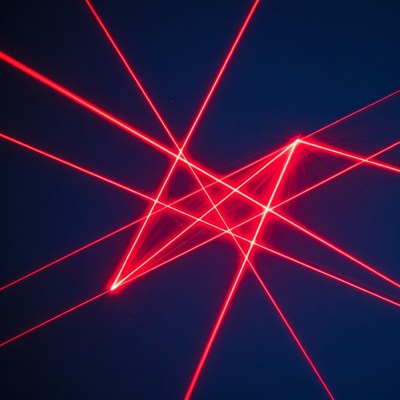 Red laser beams on dark blue background