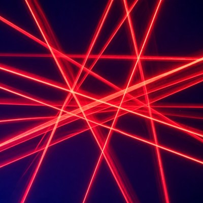 Red Laser Beams on Dark Background