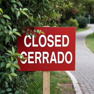 Closed Sign in Garden Path