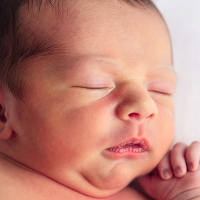 Sleeping newborn baby closeup