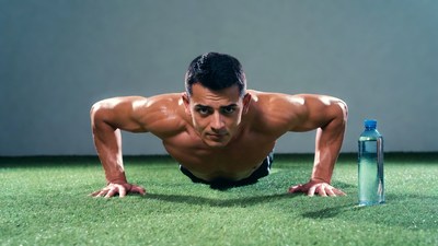 Muscular man doing pushups