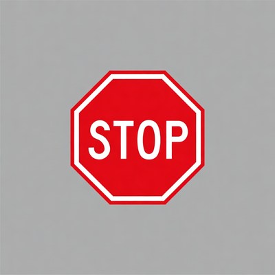Red Stop Sign on Gray Background