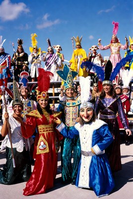 Colorful Carnival Performers in Feathered Costumes