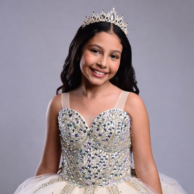 Latina girl in sparkling tiara gown