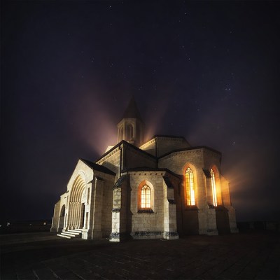 Lit Church at Night Under Stars