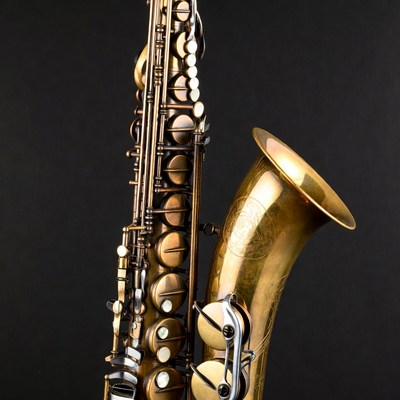 Vintage Gold Saxophone on Black Background