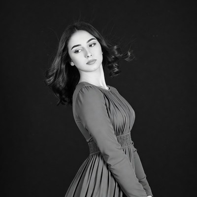 Woman in dress with flowing hair