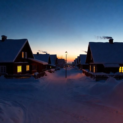 Snowy Village Street at Dusk