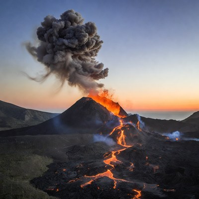 Volcano erupting with lava flows