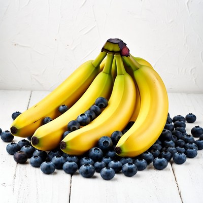 Bananas and Blueberries on White Wood